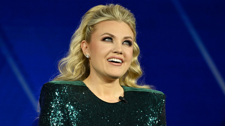 Erika Kirk wearing a green spangle dress at the Patriot Awards