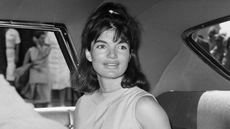 Jackie Kennedy in the back of a car