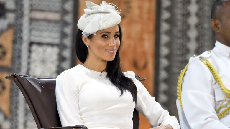 Meghan Markle wearing white in Fiji during a 2018 royal visit