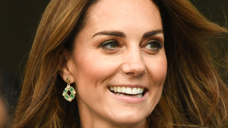 Kate Middleton smiling, looking off camera