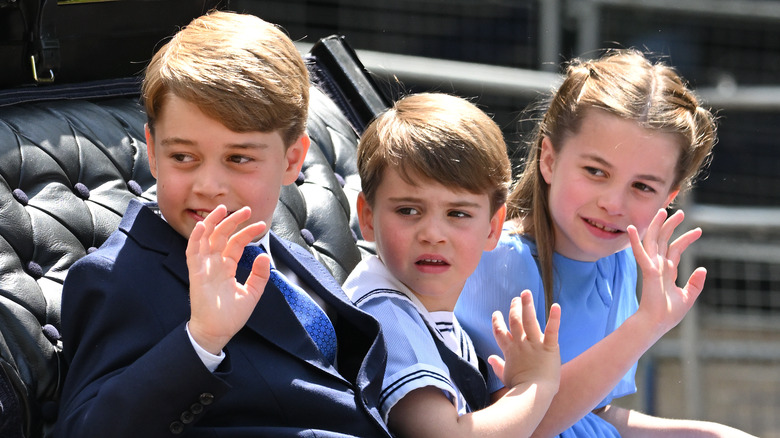 Prince George, Prince Louis, and Princess Charlotte waving