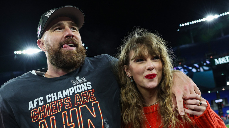 Travis Kelce and Taylor Swift celebrating the Chiefs winning the AFC Championship Game in January 2024