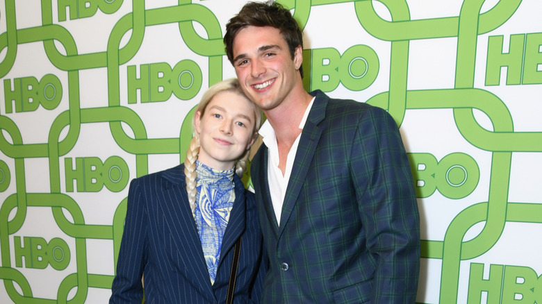 Hunter Schafer and Jacob Elordi leaning into each other.