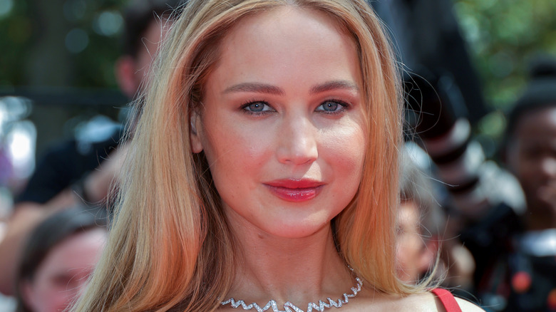 Jennifer Lawrence smiling on red carpet