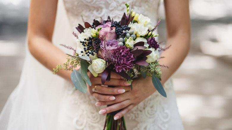 bride carrying her flowers