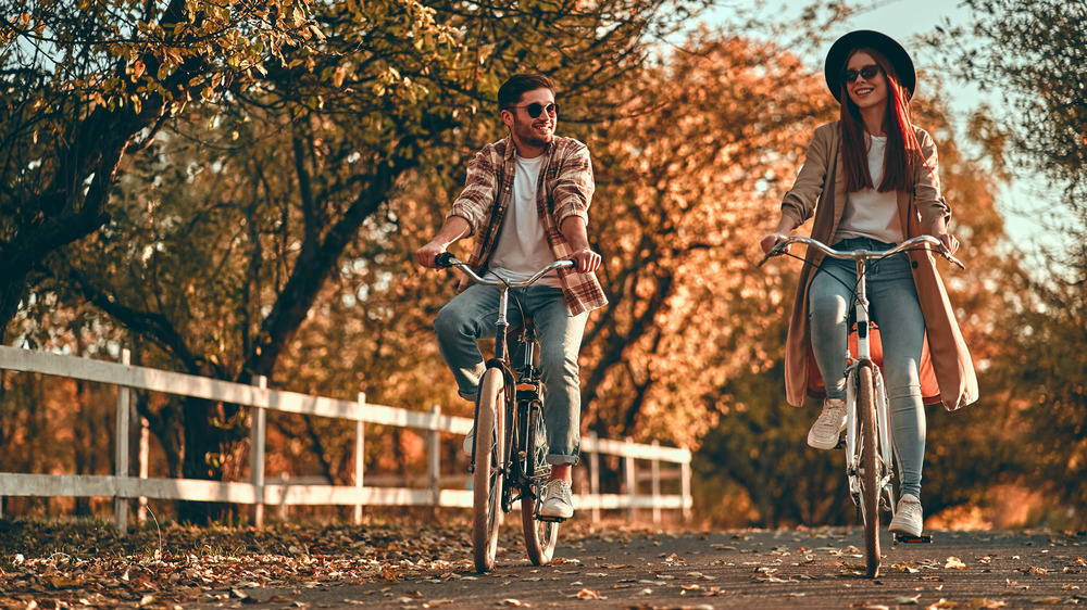 Couple on bike riding date