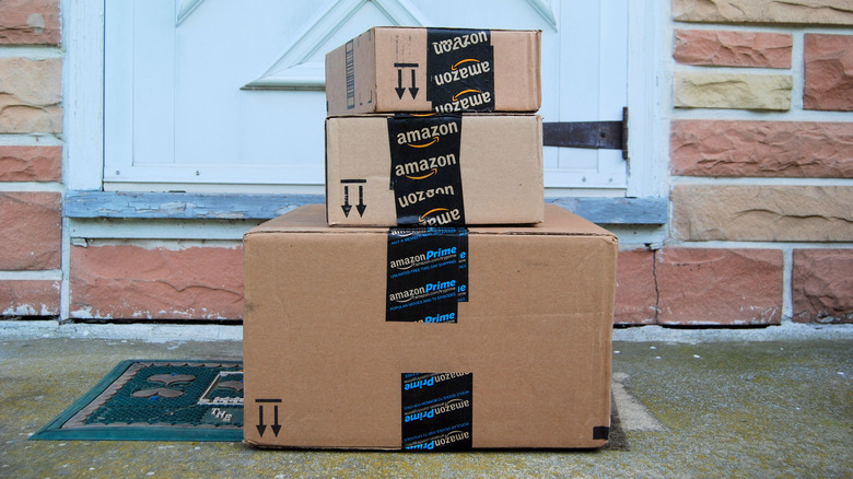Box of Amazon packages on the doorstep