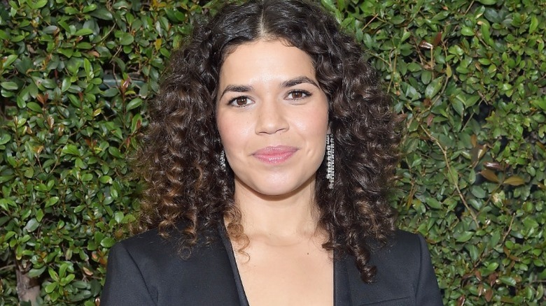 America Ferrera with backdrop of greenery
