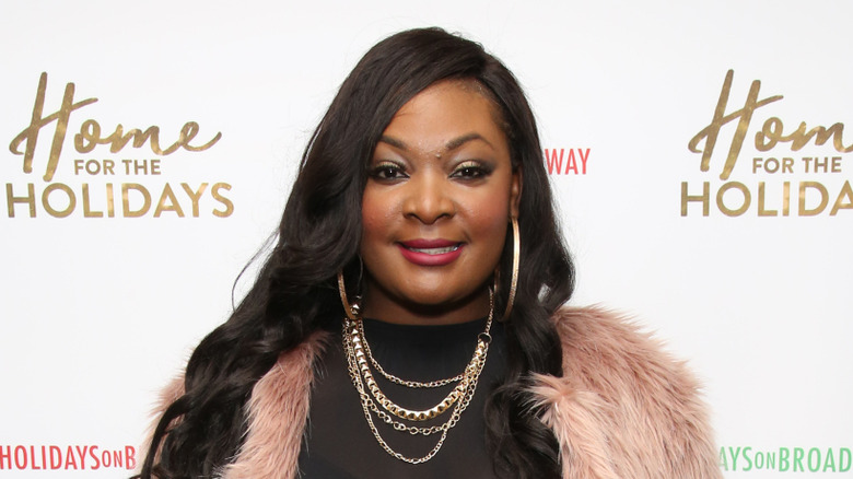 Candice Glover posing at an event