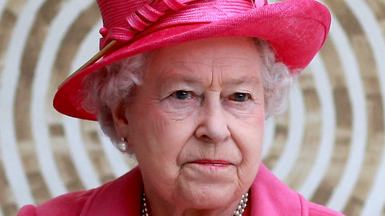 Queen Elizabeth looking stern and serious