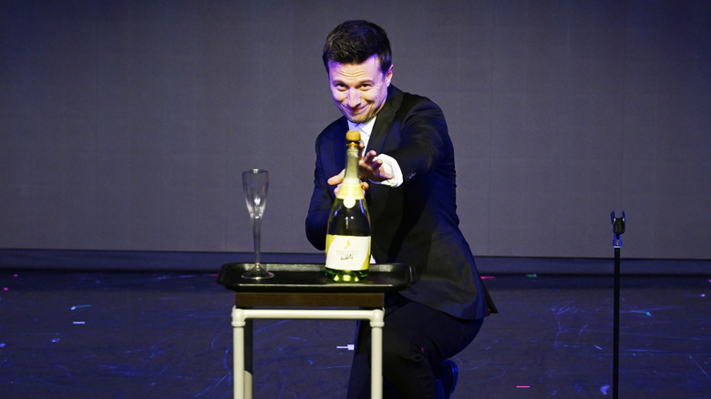 Mat Franco performing a magic act in 2025.