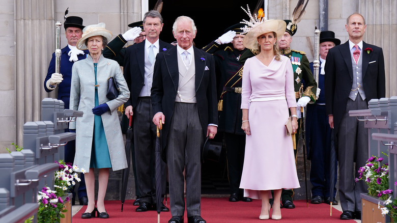 The Princess Royal, Vice Admiral Sir Timothy Laurence, Prince Charles, Prince of Wales, Sophie, Countess of Wessex and Prince Edward, Earl of Wessex during a garden party at the Palace of Holyroodhouse in Edinburgh on June 29, 2022. The party is part of The Queen's traditional trip to Scotland for Holyrood Week.