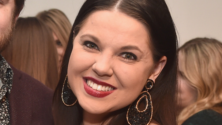 Amy Duggar King smiling tilting head