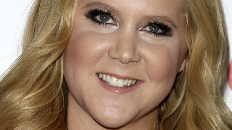 Amy Schumer smiles up close