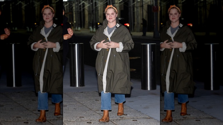 Amy Schumer in a jacket and orange bandana