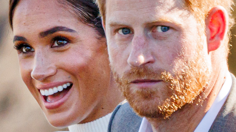 Prince Harry & Meghan Markle standing together