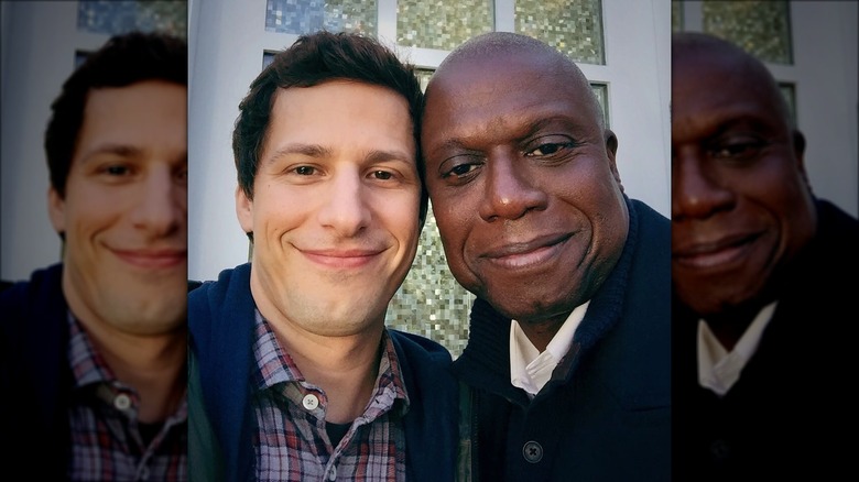 Andre Braugher and Andy Samberg smiling
