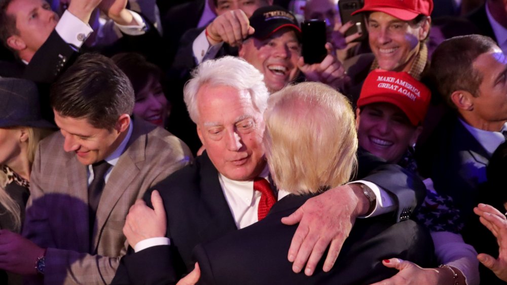 Robert and Donald Trump hugging