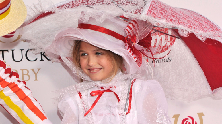 Dannielynn Birkhead smiling at the Barnstable Brown Gala in 2013
