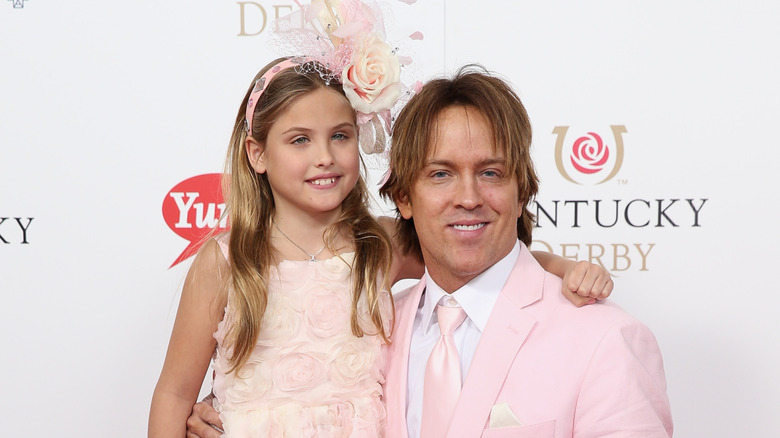 Larry and Dannielynn Birkhead smiling at the Kentucky Derby in 2015