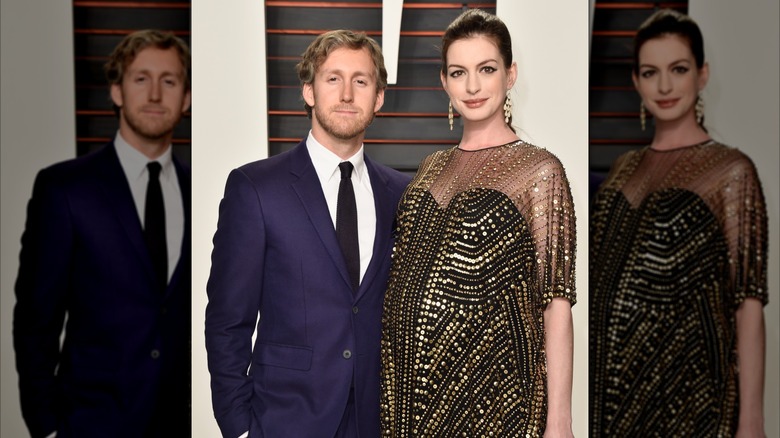 Adam Shulman and Anne Hathaway attend a red carpet event in 2016