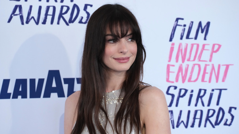 Anne Hathaway smiling and posing 