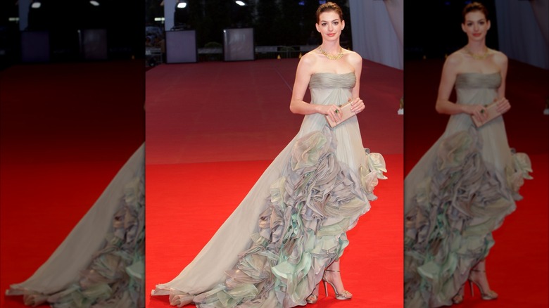 Anne Hathaway walking the red carpet the 2008 Venice Film Festival