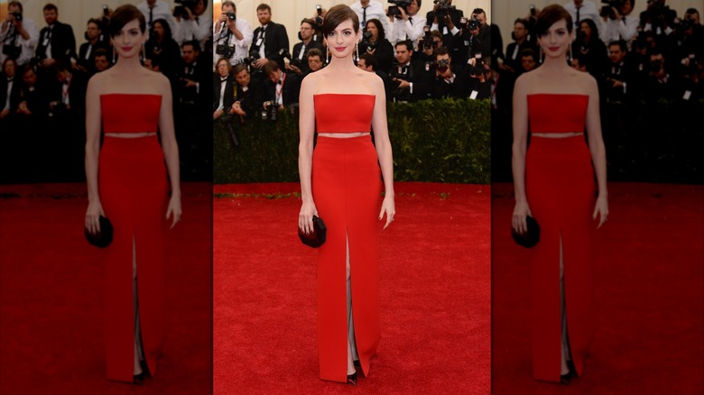Anne Hathaway walking the red carpet at the 2014 Met Gala