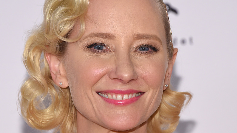 Anne Heche smiling for photo 