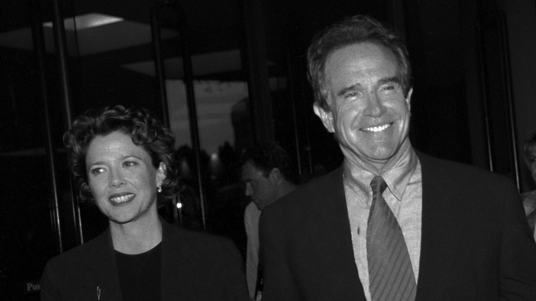 Annette Bening and Warren Beatty smiling and posing.