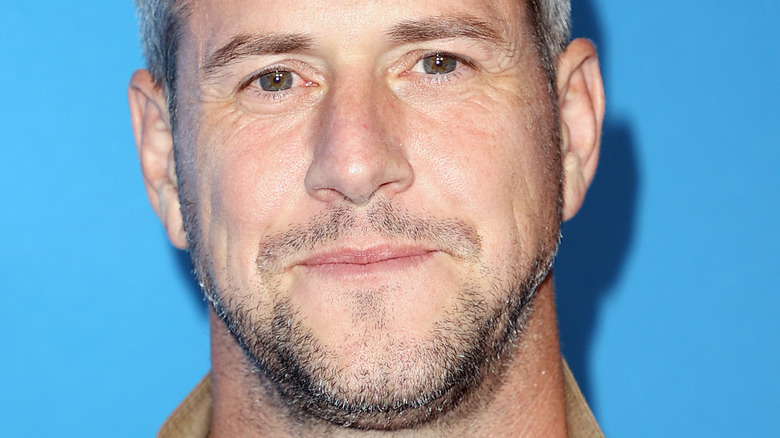 close up of Ant Anstead with a faint smile