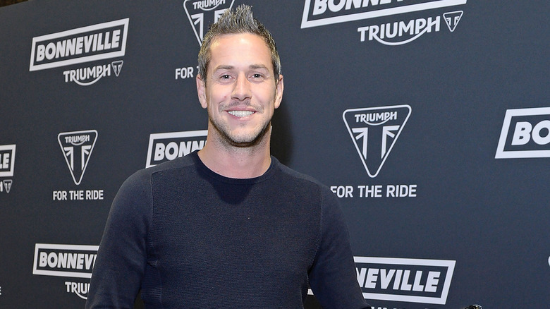 Ant Anstead posing at the Global Triump Bonneville Launch