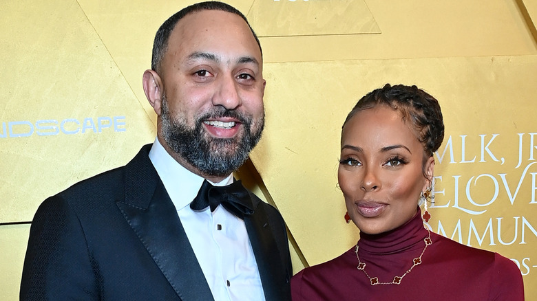 image of Mike Sterling and Eva Marcille smiling side by side at an event