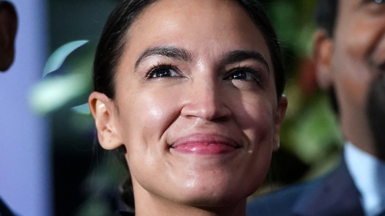 Representative Alexandria Ocasio-Cortez smiling