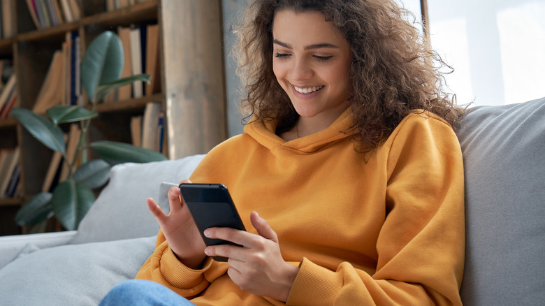 Woman looking at a smartphone