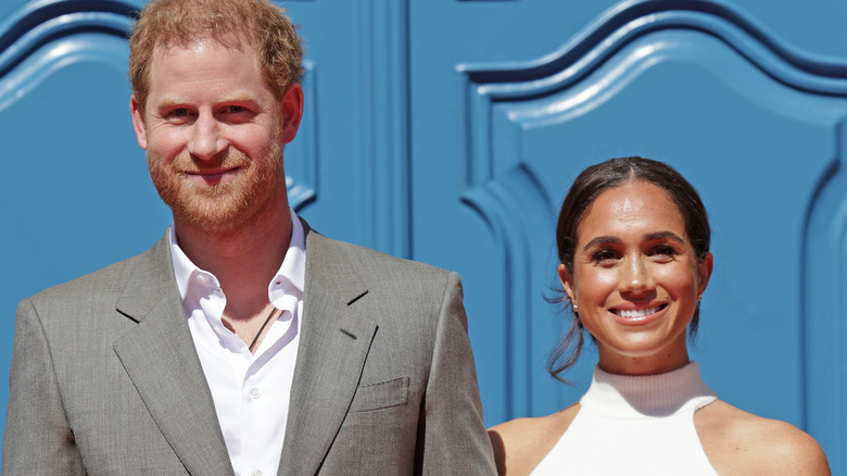 Prince Harry and Meghan Markle smiling