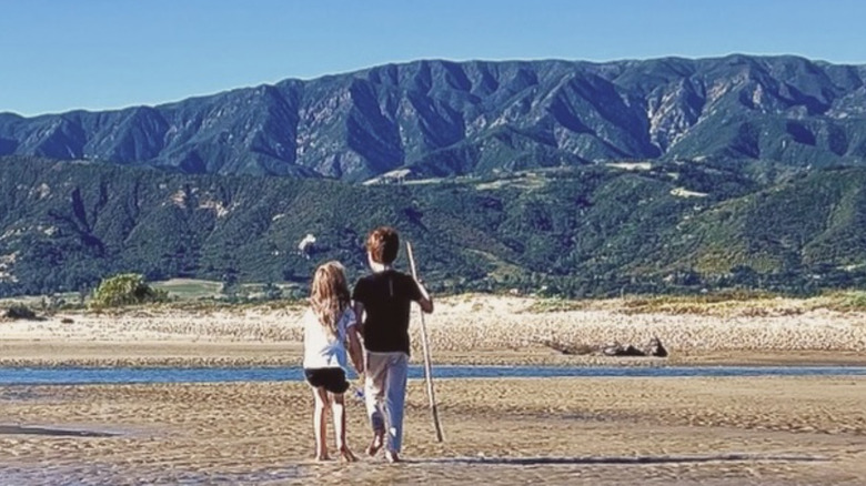 Prince Archie and Princess Lilibet playing on the beach