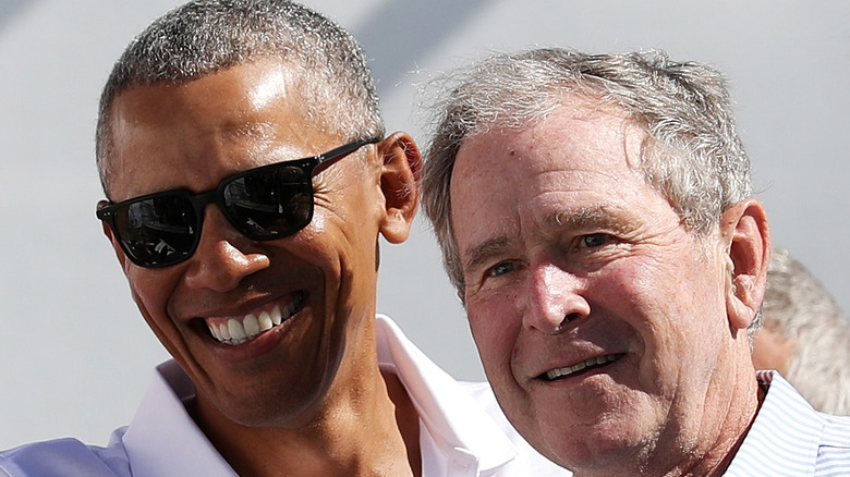 Barack Obama and George W. Bush