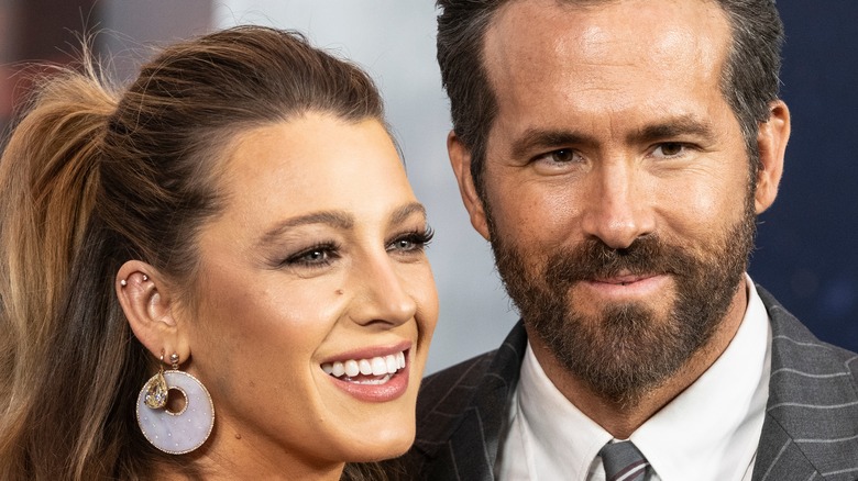 Blake Lively and Ryan Reynolds pose for a photo. 