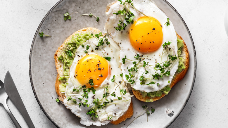 Eggs with soft yolks on toast