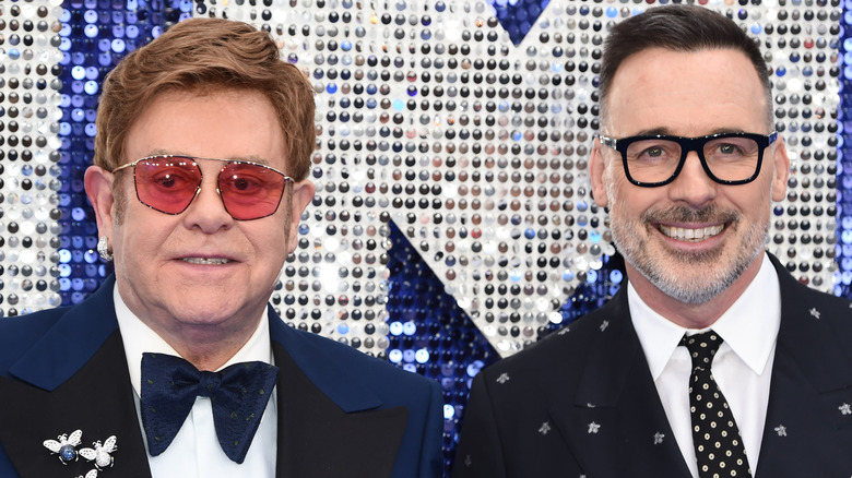 Elton John and his husband David Furnish at an event