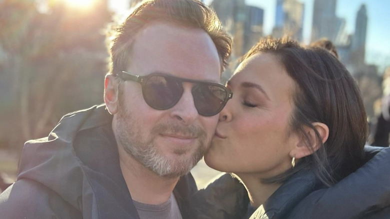 Erin Krakow kissing Ben Rosenbaum on cheek