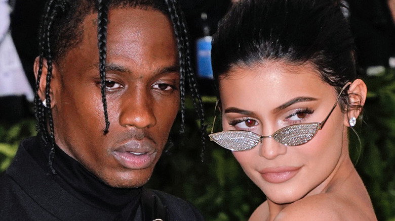 Travis Scott and Kylie Jenner at event