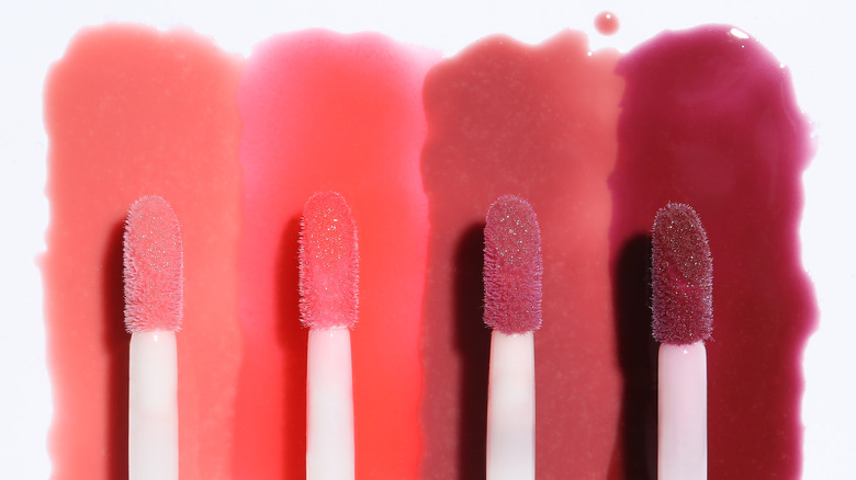 four lip stain brushes 