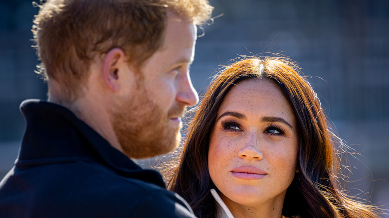 Prince Harry and Meghan Markle at an event. 