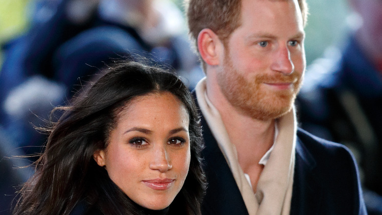 Prince Harry and Meghan Markle at an event. 