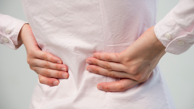 person with a sore back
