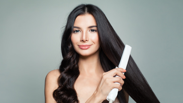 Woman using flatiron