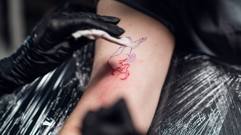 The process of tattooing