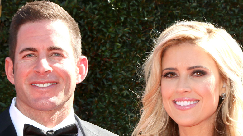 Tarek El Moussa and Christina Haack posing at event